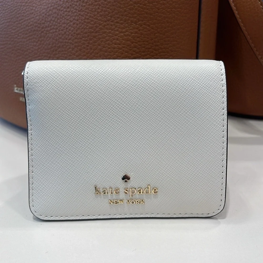 Kate Spade Madison Small Bifold Wallet
Meringue 
NWT - Picture 6 of 16